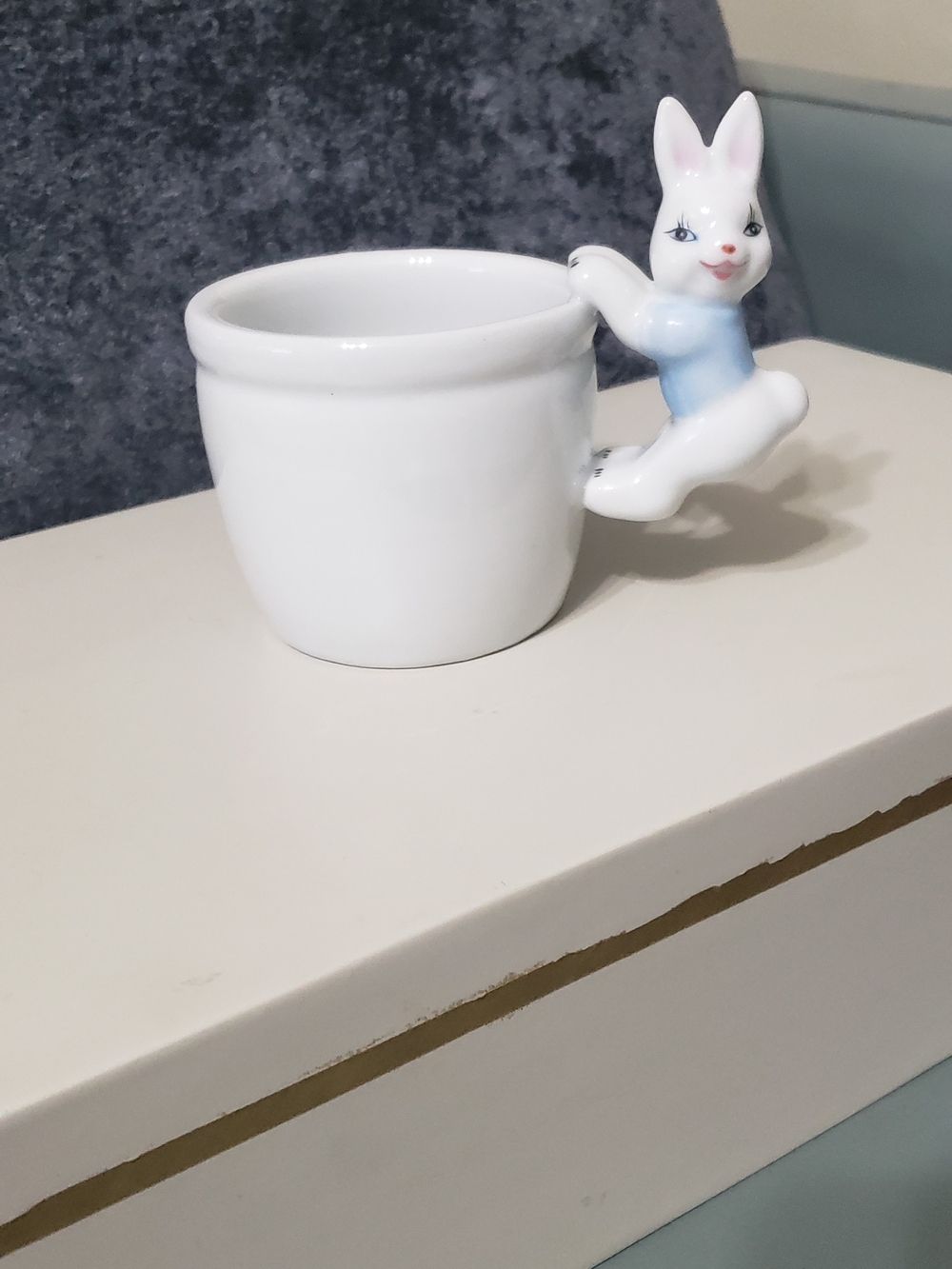 White Ceramic Mug with Playful Bunny Handle - White and Light Blue